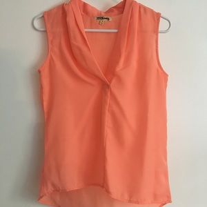 Peach sleeveless blouse